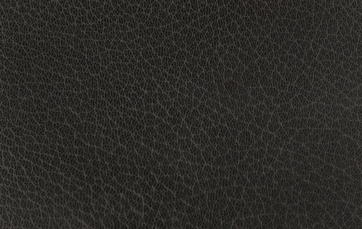 Dark brown textured leather surface