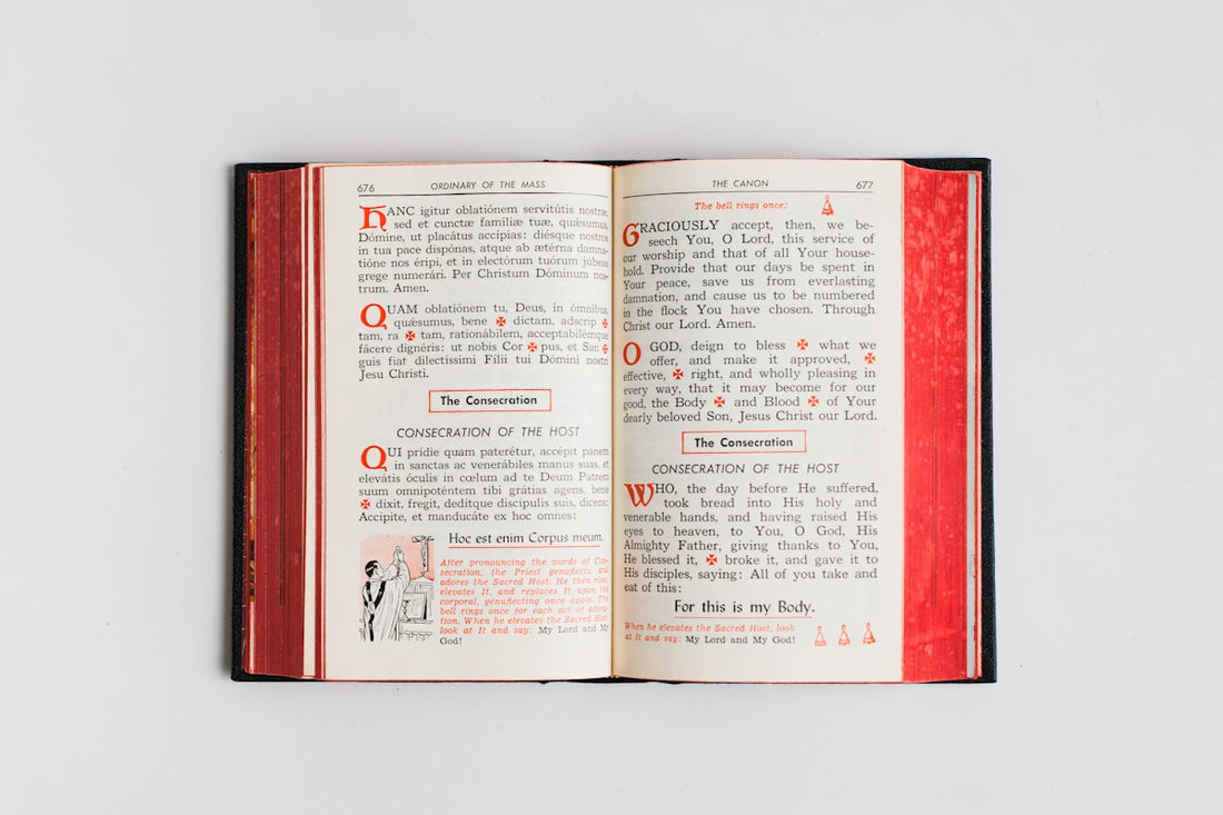 Open book with red cover and white pages