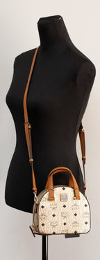 Pebbled Leather Half Moon Mini Round Top Tote